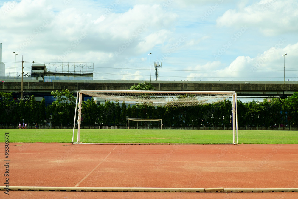 Fototapeta premium Football and soccer gates on the grass field