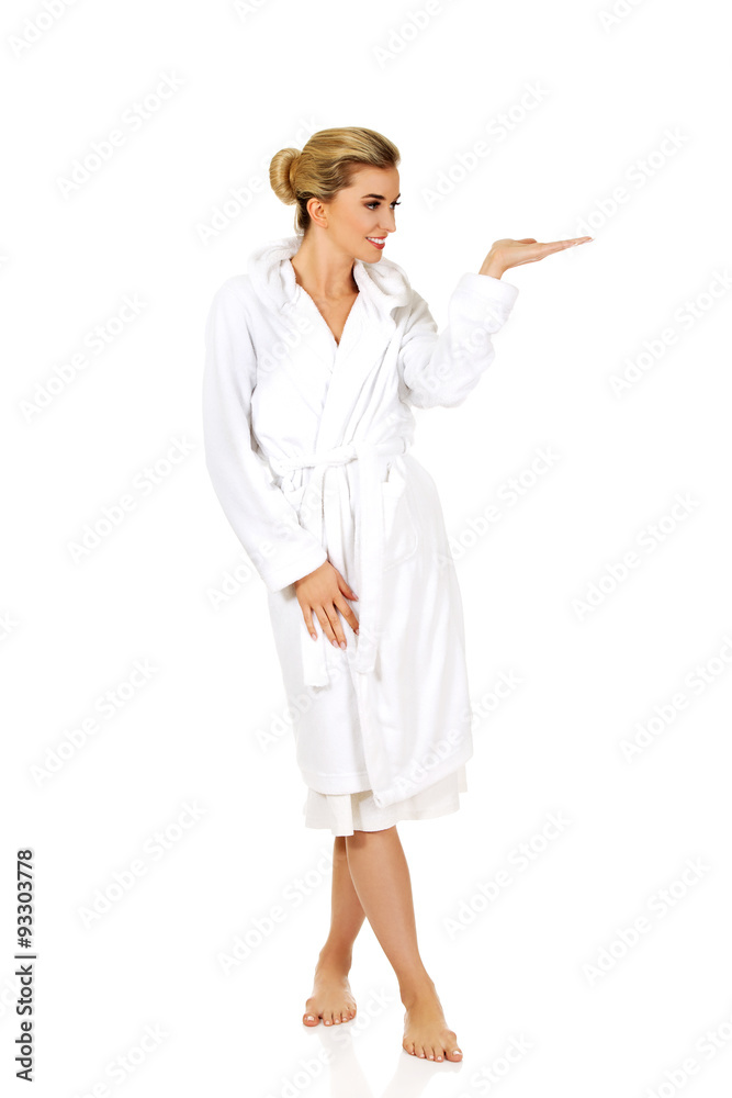 Young beautiful woman after bath shows somenthing Young beautiful woman after bath shows somenthing