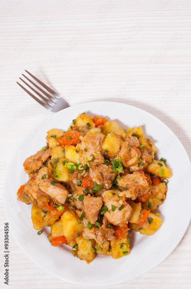 stewed meat with potatoes, onion and carrot stewed meat with potatoes, onion and carrot
