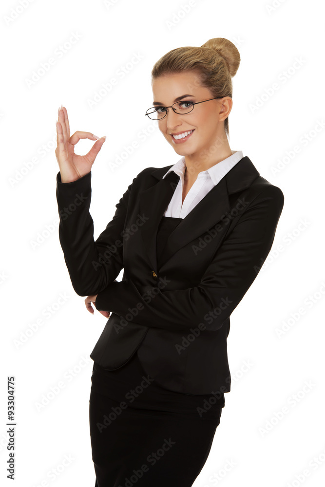 Young businesswoman showing perfect sign Young businesswoman showing perfect sign
