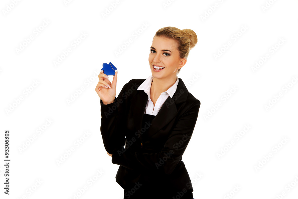 Businesswoman real estate agent with house pendant Businesswoman real estate agent with house pendant