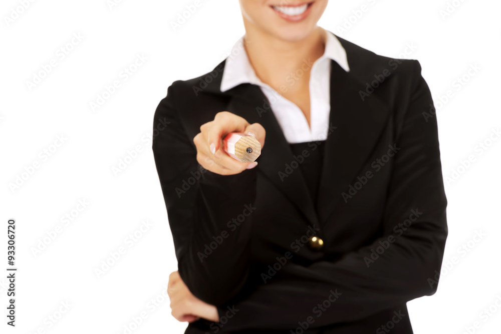 Young businesswoman with big pen