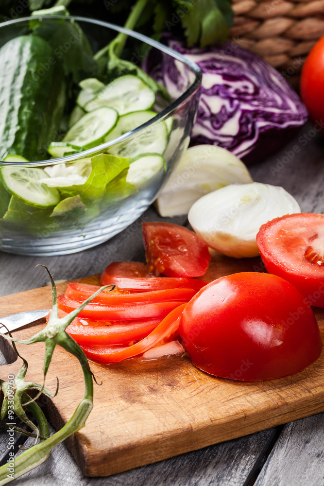 Chopped vegetables: tomatoes on cutting board Chopped vegetables: tomatoes on cutting board