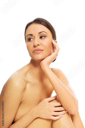 Beautiful spa woman sitting and thinking