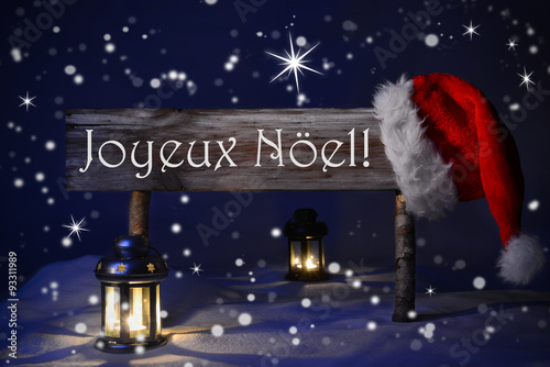 Sign Candlelight Santa Hat Joyeux Noel Means Merry Christmas  photo