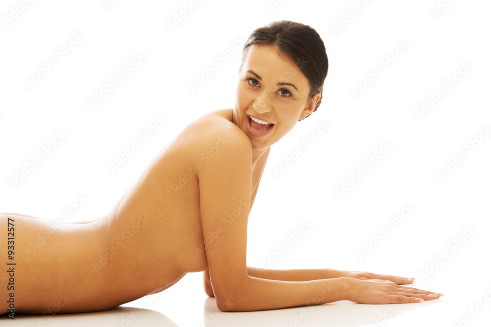 Portrait of nude woman propping herself on floor Portrait of nude woman propping herself on floor