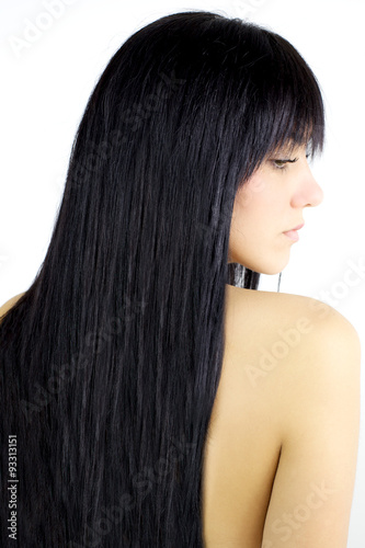 Hair. Beauty Girl with Long Straight Black Healthy Hair