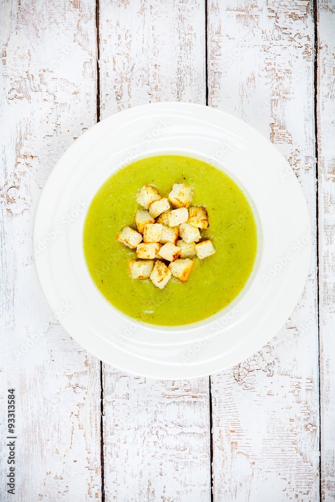 homemade cream soup with broccoli and croutons homemade cream soup with broccoli and croutons
