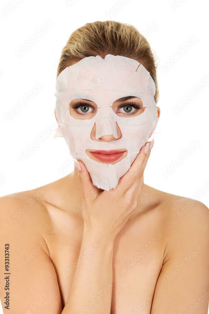 Young woman with facial mask Young woman with facial mask