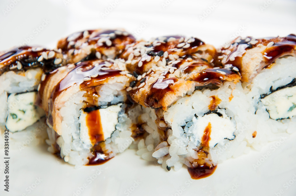 traditional fresh japanese sushi rolls on a white background traditional fresh japanese sushi rolls on a white background