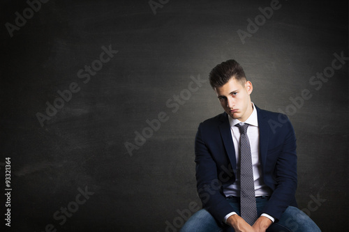 bored worker on little chair