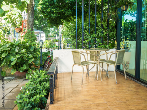 Wallpaper Mural Wooden dining table at balcony in morning time. Torontodigital.ca