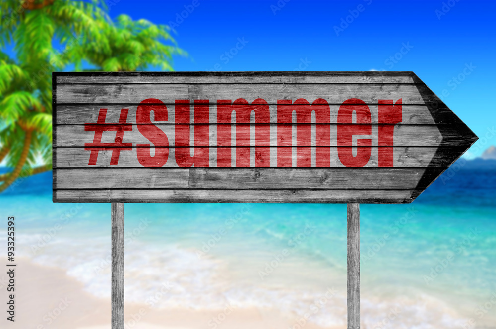 Red The word with hashtag SUMMER wooden sign with on a beach bac