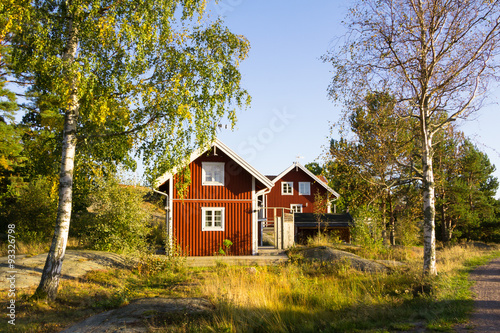 Red cottages on the island Harstena in Sweden, principally known