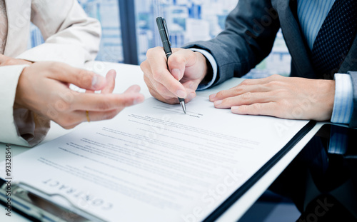 Business man signing a contract