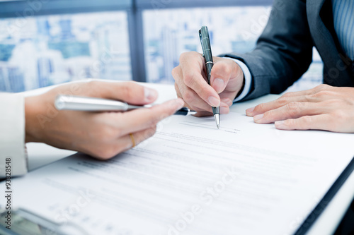 Business man signing a contract