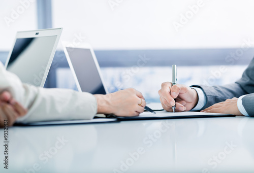 Business man signing a contract