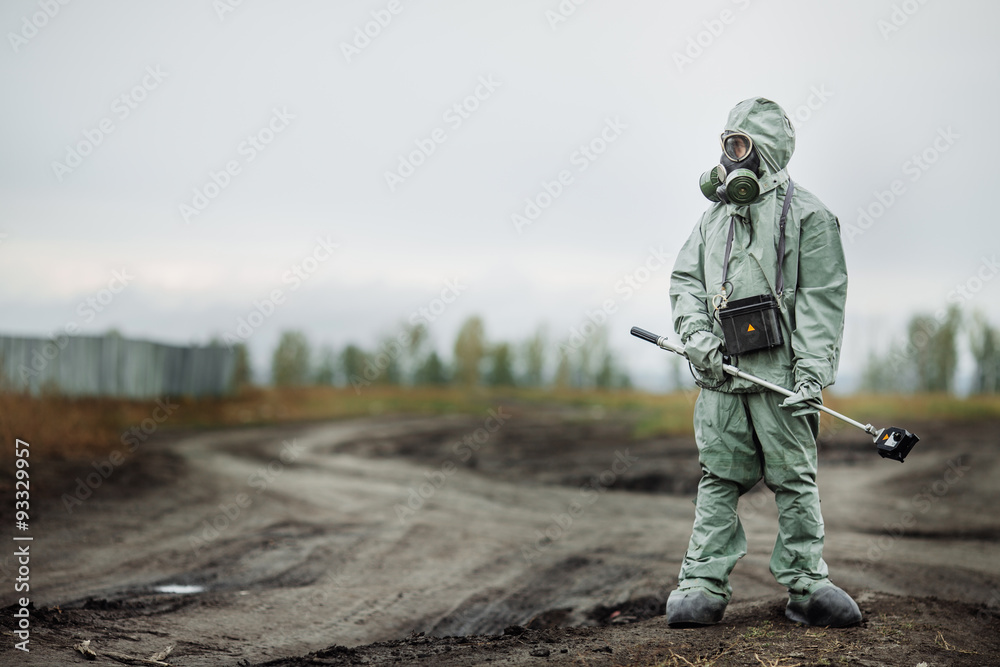 Scientist (radiation supervisor) in protective clothing and gas Scientist (radiation supervisor) in protective clothing and gas
