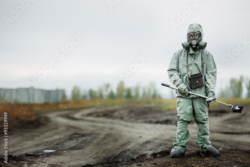 Scientist (radiation supervisor) in protective clothing and gas photo