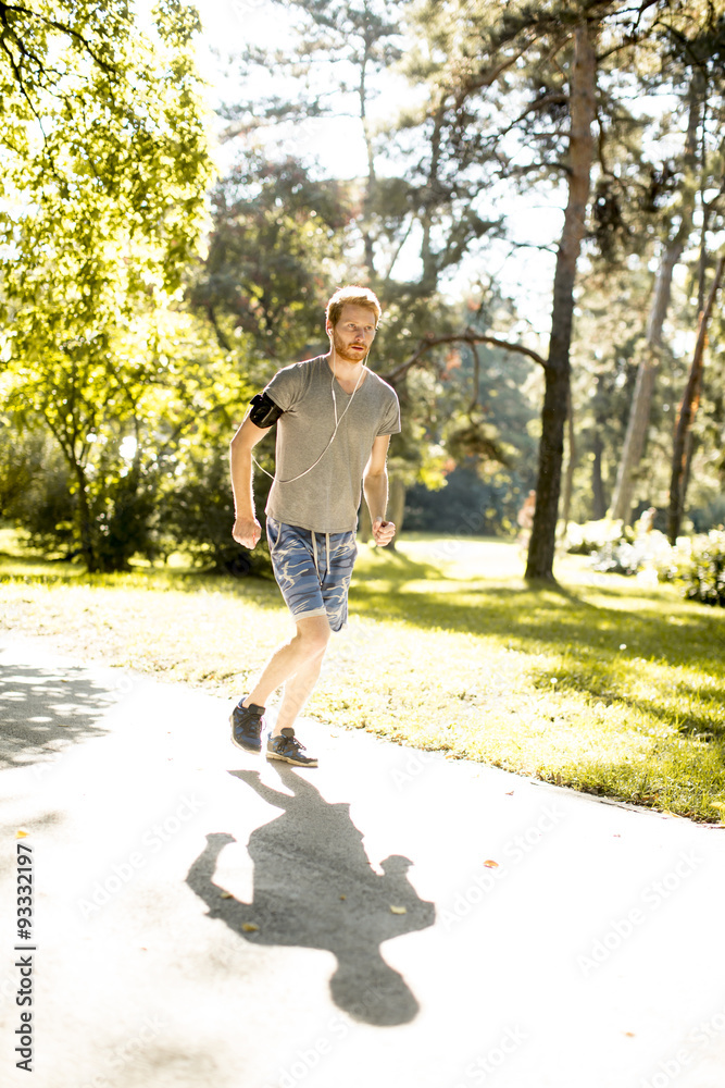 Fototapeta premium Young man running outdoor