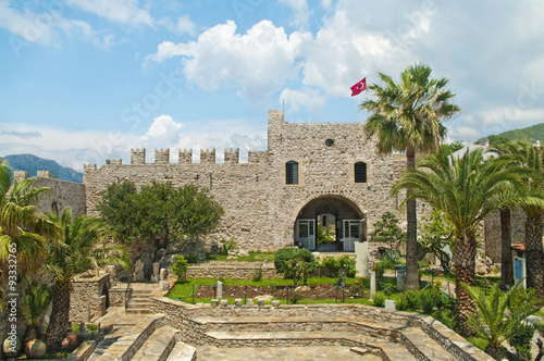 view of castle and small garden from inside
