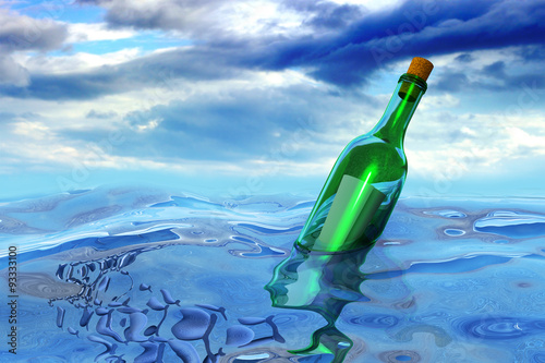 Floating green glass wine bottle with a secret message in the open sea with a sky and clouds