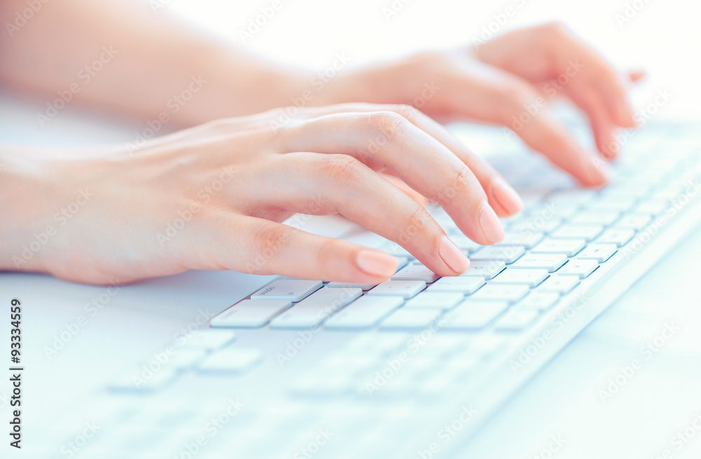 Female hands or woman office worker typing on the keyboard Female hands or woman office worker typing on the keyboard