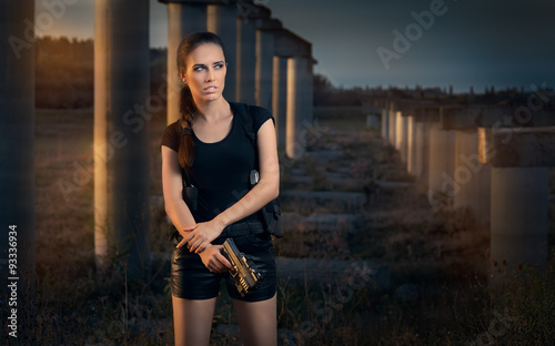 Powerful Woman Holding Gun Action Movie Style