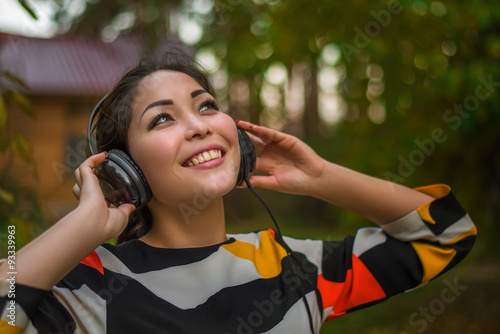Young beautiful girl happy and dancing