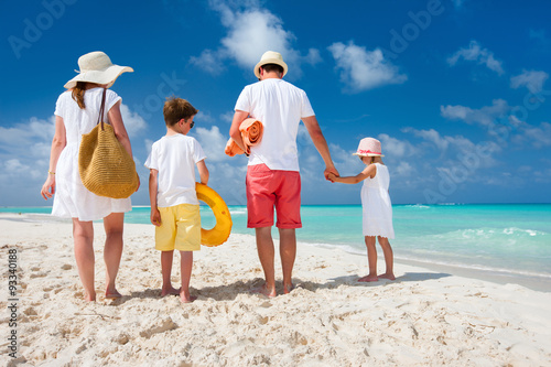 Family with kids on beach vacation