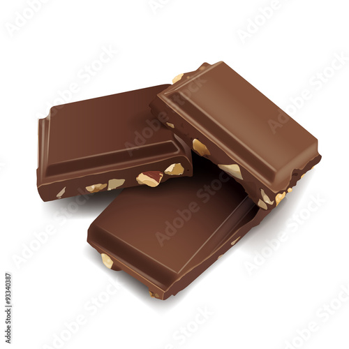 Three chocolate bars lying on top of one another isolated on the