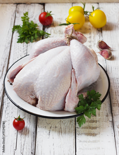 Chicken on a white wooden background