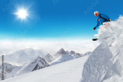 Jumping skier at jump