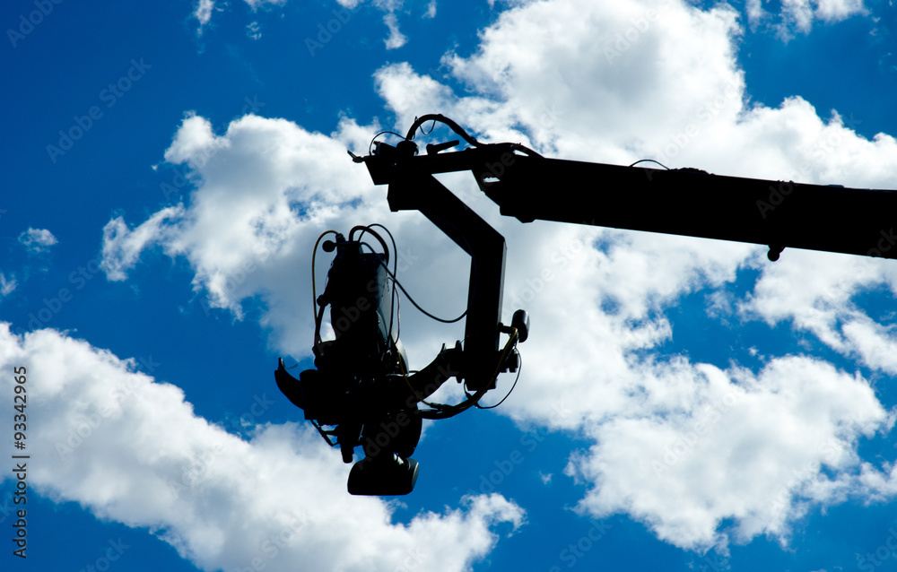 Television camera on dolly silhouette Television camera on dolly silhouette