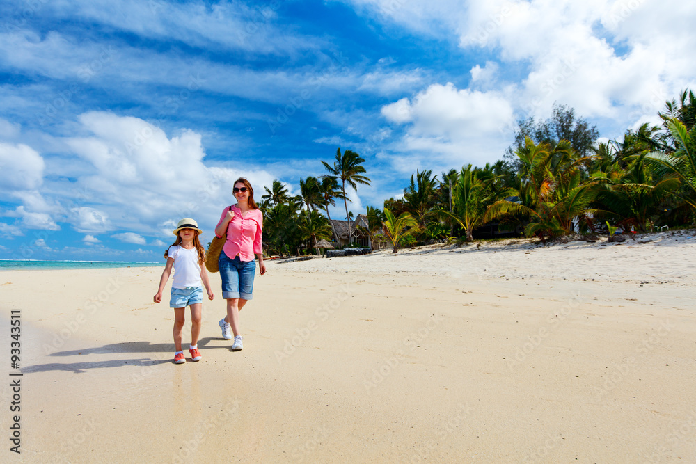 Mother and daughter on a beach
