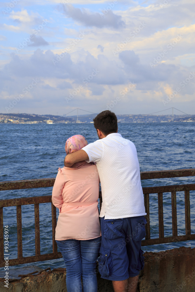 Young couple waching sea,Istanbul,Turkey.