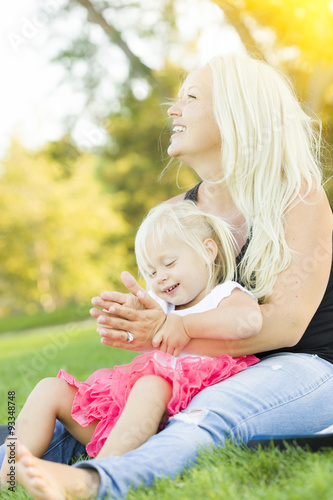 Mother and Little Girl Havi...