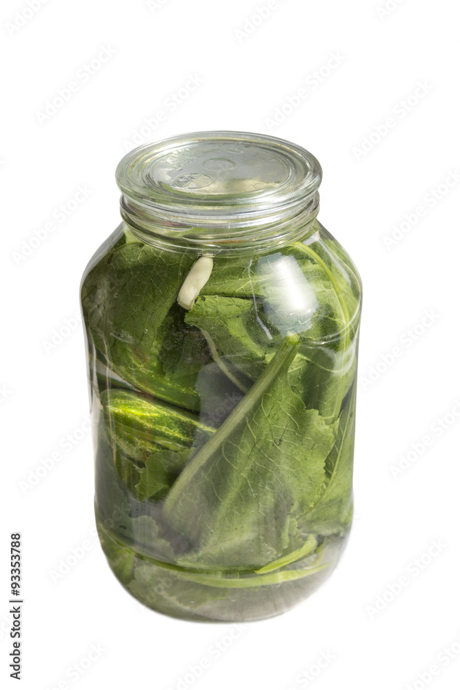 Pickles in a jar on a white background Pickles in a jar on a white background