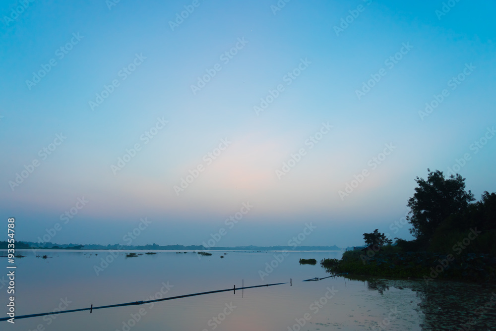 Violet sky beautiful morning before rising sun near the lake Violet sky beautiful morning before rising sun near the lake
