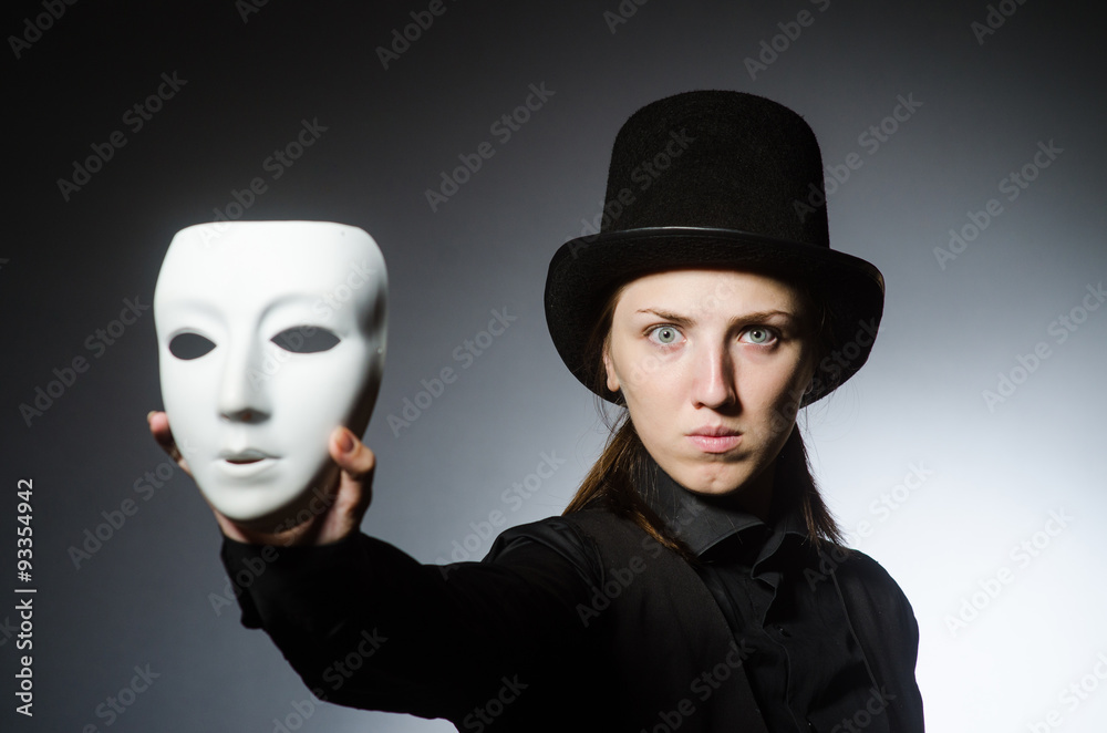 Woman with mask in funny concept Woman with mask in funny concept