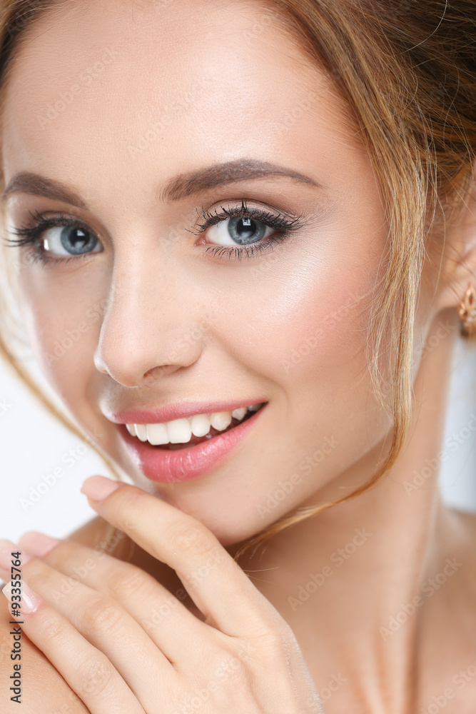 Obraz premium Portrait of beautiful woman on white background