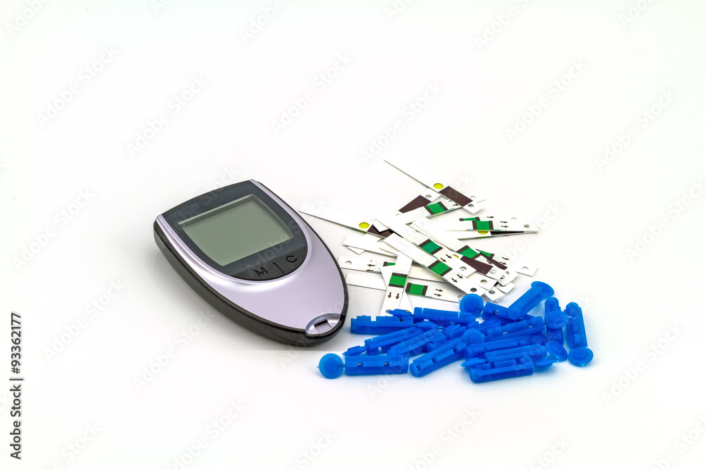 Many strip test of blood glucose meter, the blood sugar value is measured on a finger on white background Many strip test of blood glucose meter, the blood sugar value is measured on a finger on white background