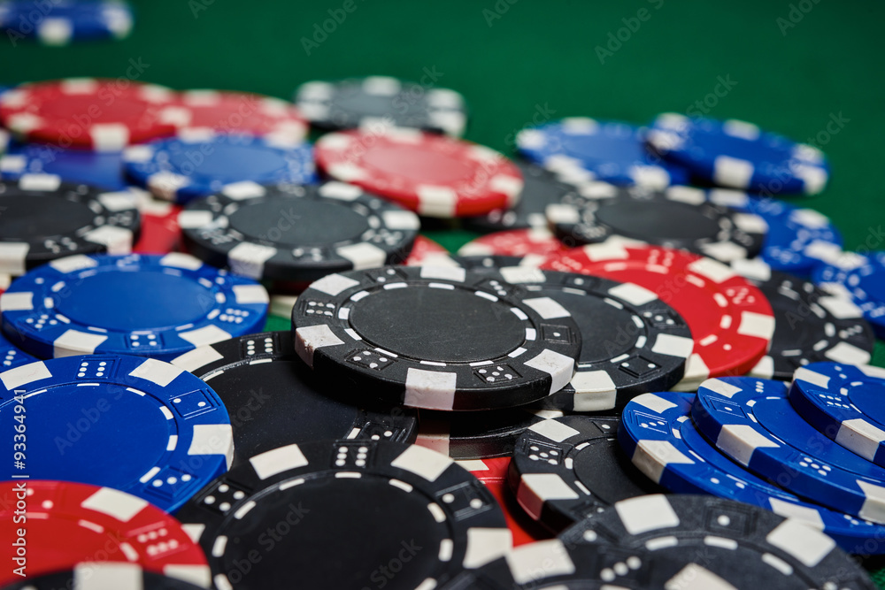 Poker chips on table Poker chips on table