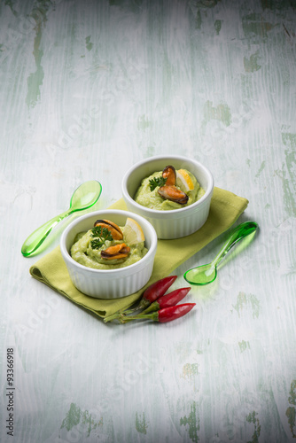 avocado cream with mussel appetizer