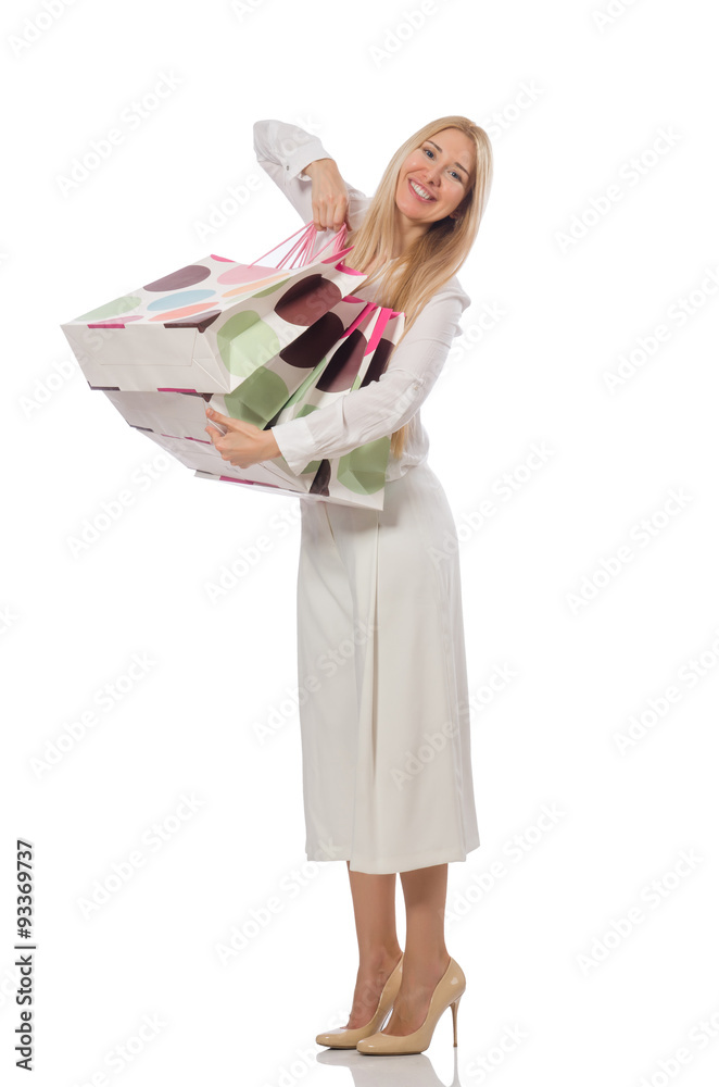 Woman with shopping bags on white