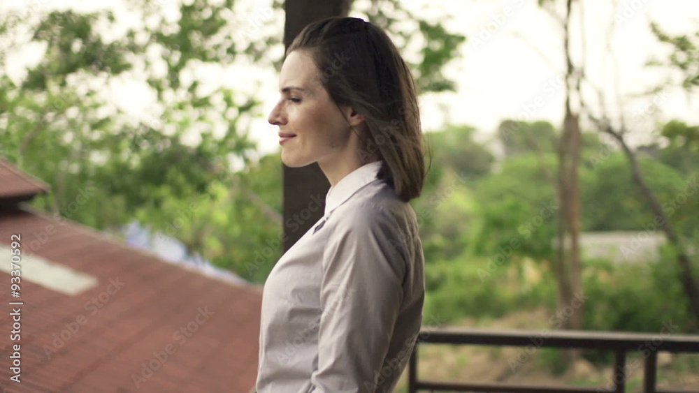 Young, pretty businesswoman relaxing on terrace
Young, pretty businesswoman relaxing on terrace