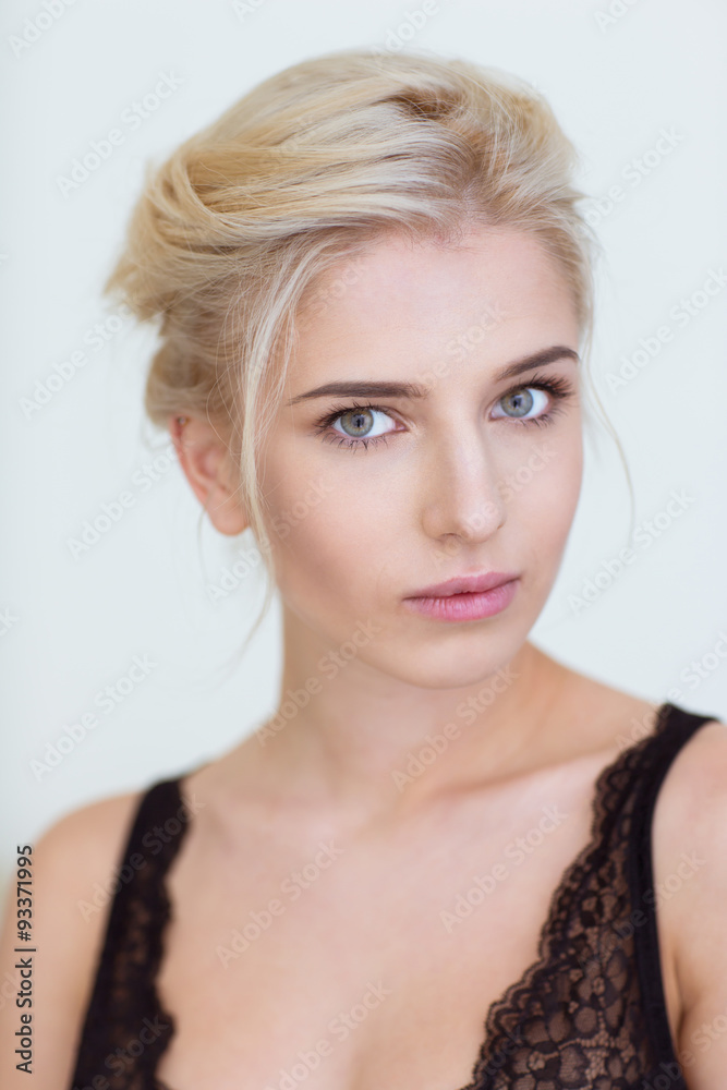 Portrait of a charming woman looking at camera Portrait of a charming woman looking at camera