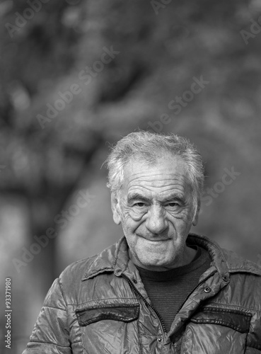 Black and white image of an handsome old man