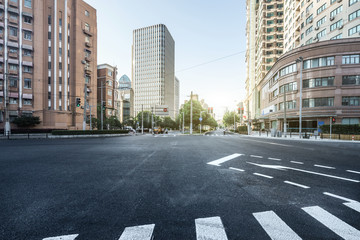 empty asphalt road of a modern city with skyscrapers
