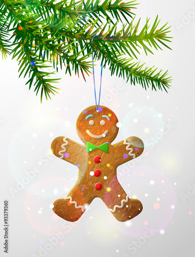 Christmas tree branch with hanging gingerbread man